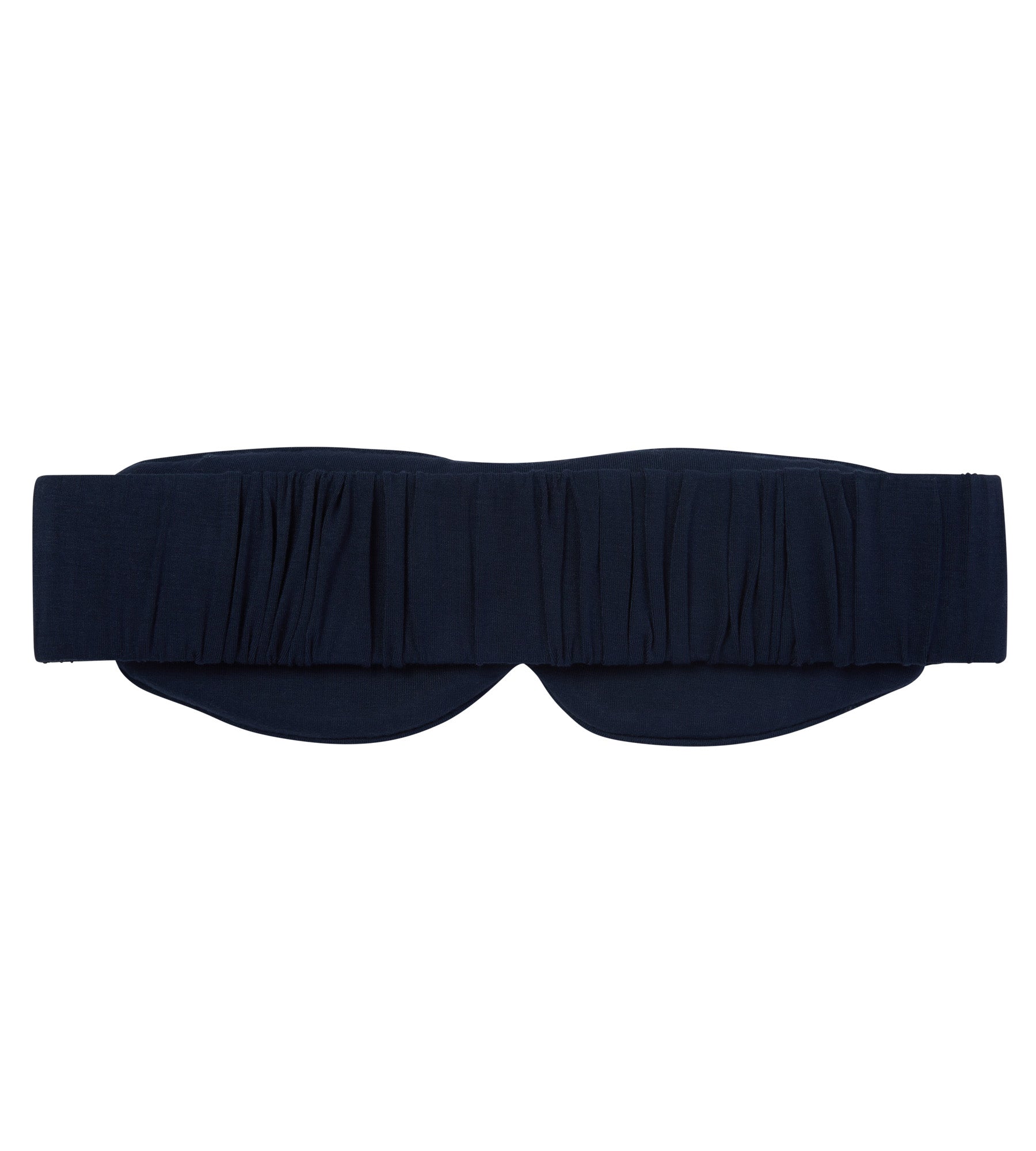 The back of a dark navy blue sleep mask with a pleated, ruffled texture across the forehead, shown flat against a solid white background.