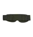 The back of an olive green eye mask with a gathered elastic strap, shown flat against a solid white background.