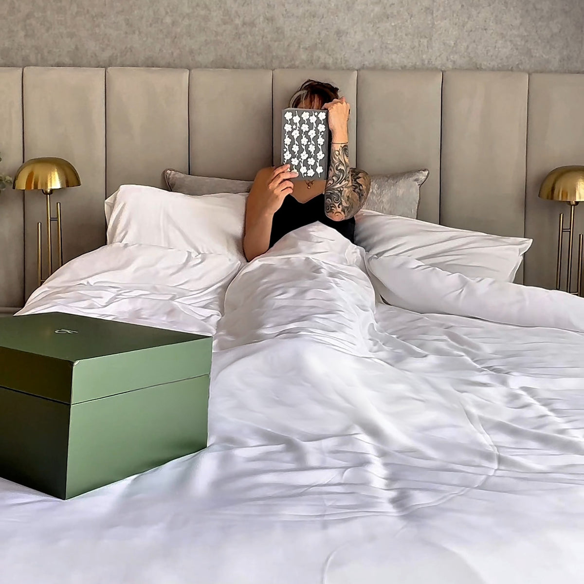 Relaxing in bed with light bamboo bedding
