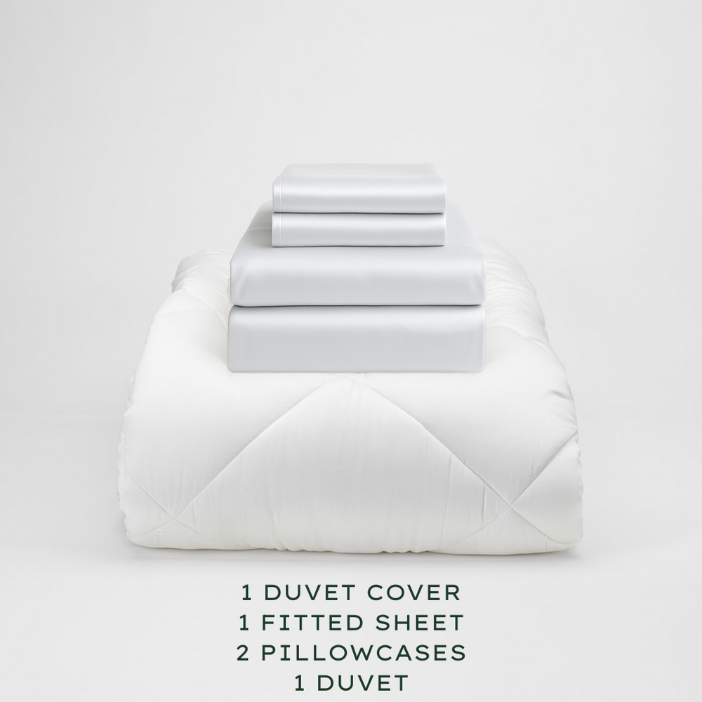 
                  
                    Soft Grey bedding set with duvet, duvet cover, fitted sheet, and pillowcases on a light gray background.
                  
                