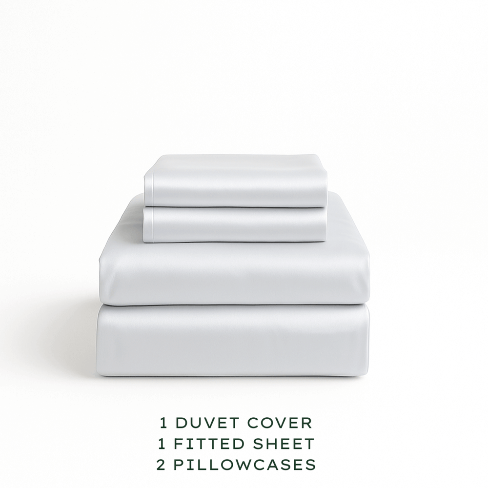 
                  
                    Soft Grey bedding set with duvet cover, fitted sheet, and pillowcases on a white background.
                  
                