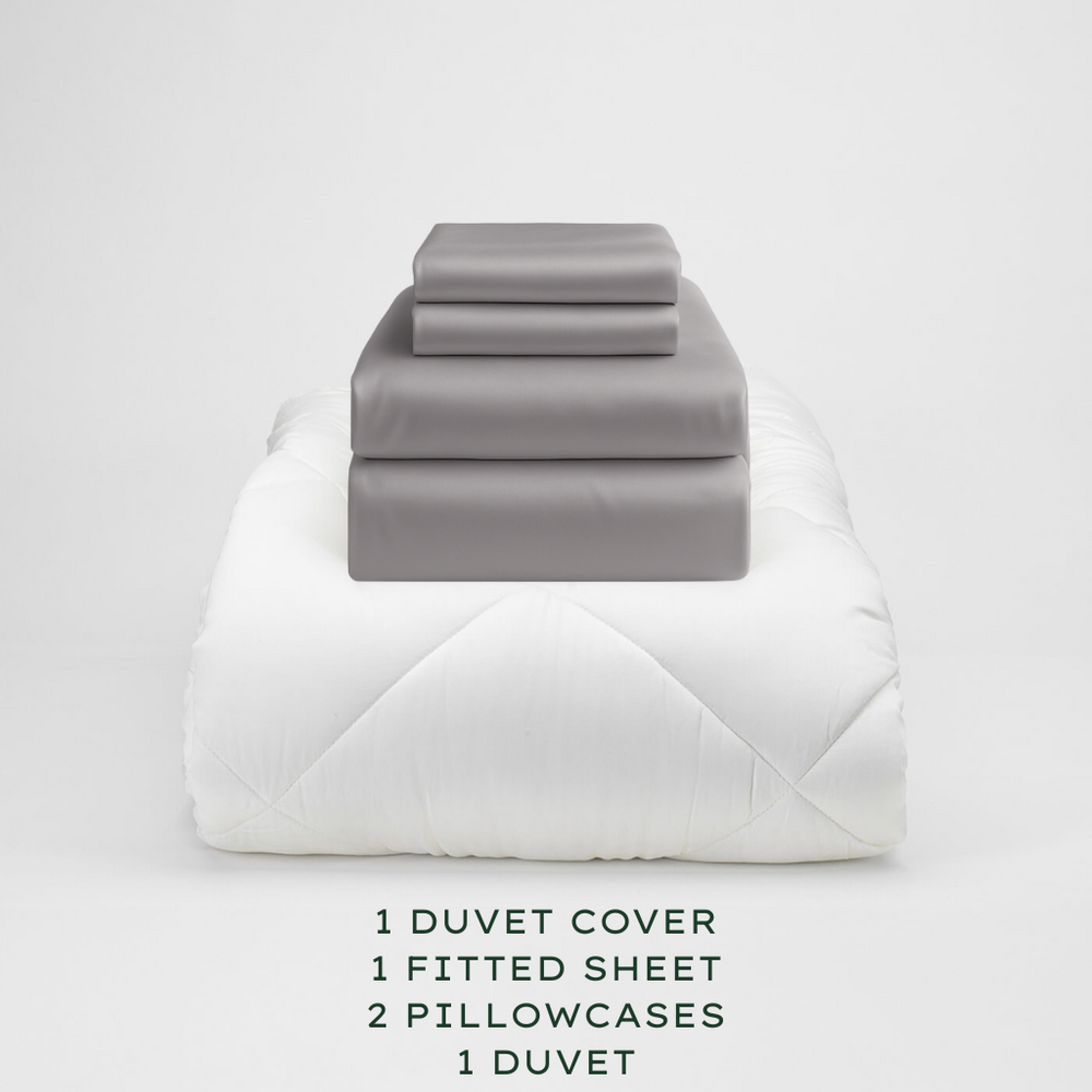 
                  
                    Warm Grey bedding set with duvet, duvet cover, fitted sheet, and pillowcases on a light gray background.
                  
                