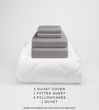 Warm Grey bedding set with duvet, duvet cover, fitted sheet, and pillowcases on a light gray background.