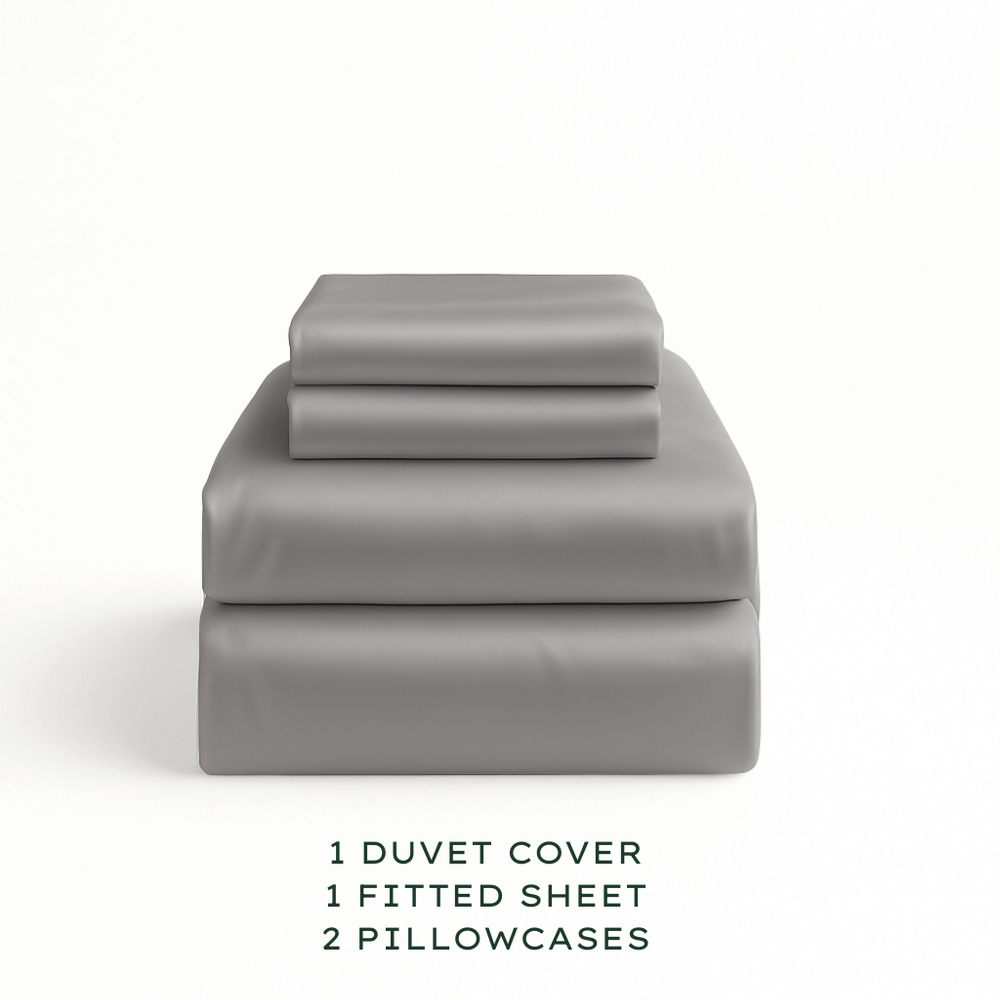
                  
                    Warm Grey bedding set with duvet cover, fitted sheet, and pillowcases on a white background.
                  
                