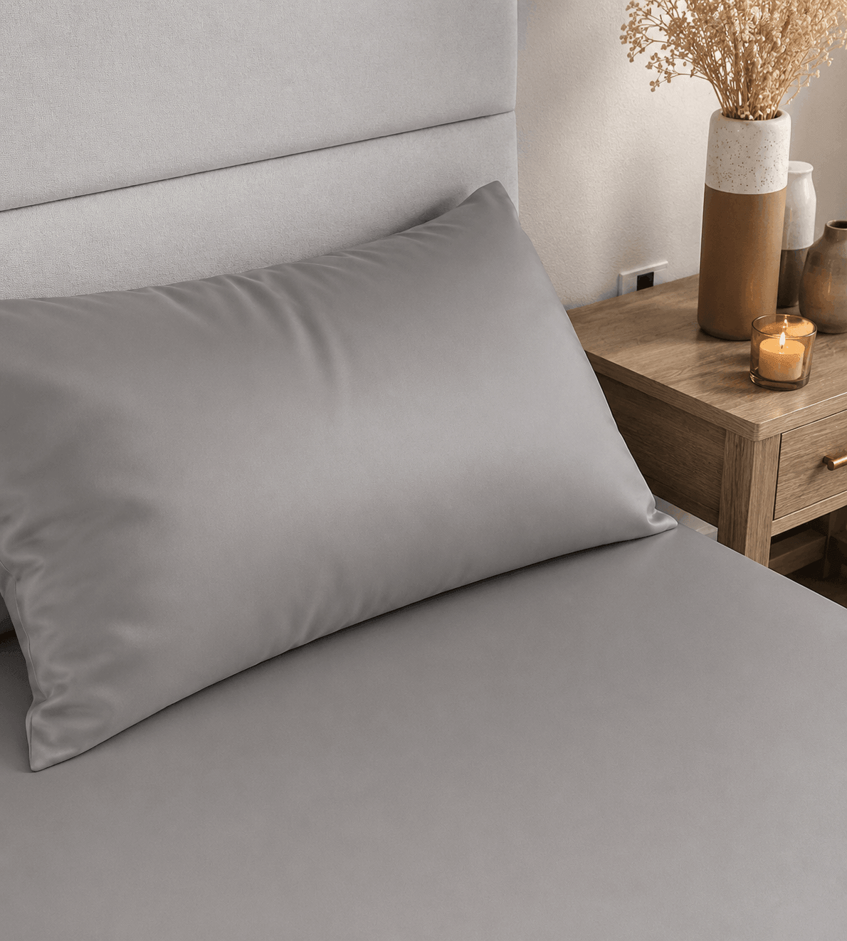 Warm Grey fitted sheet on bed